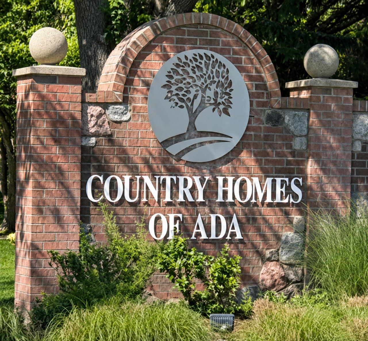 Community entrance sign for Country Homes of Ada