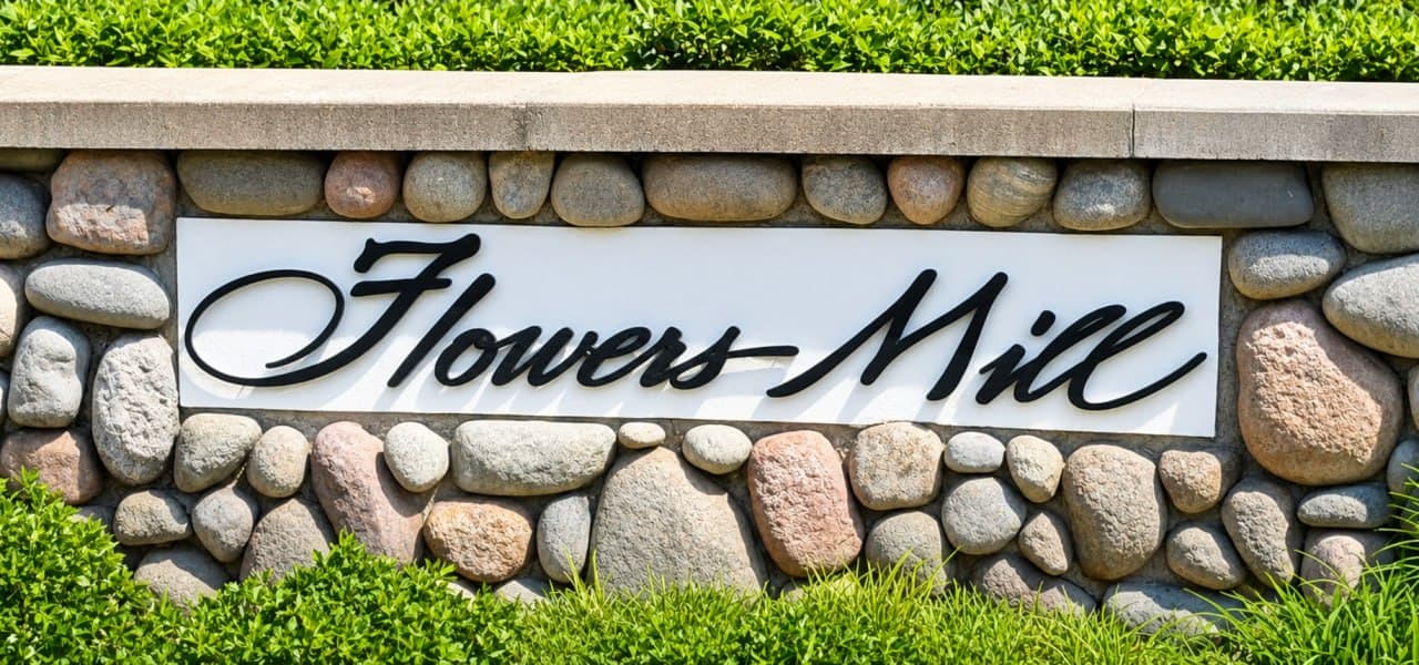 Community entrance sign for Flowers Mill
