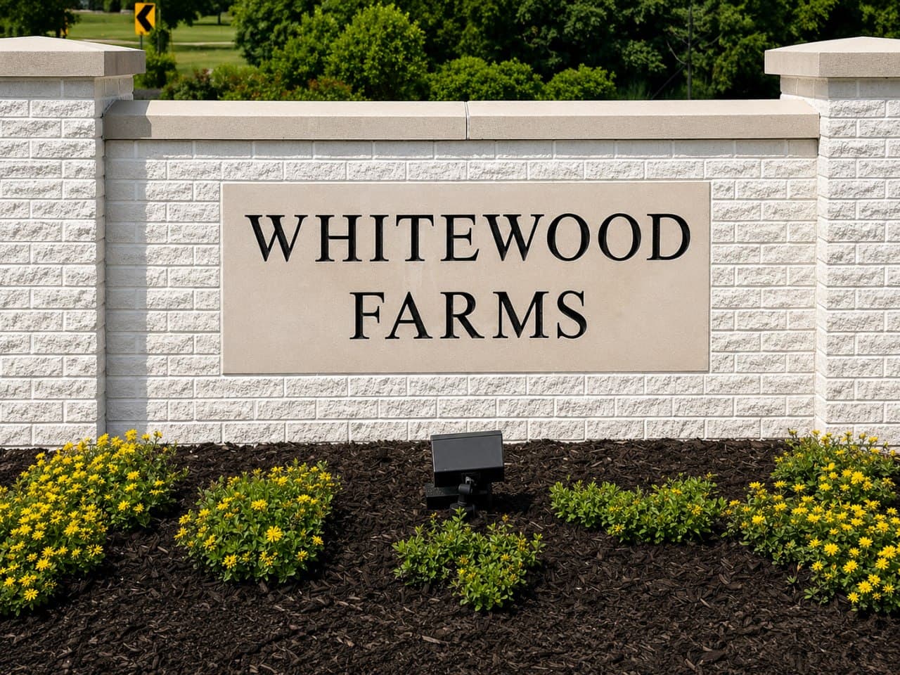 Community entrance sign for Whitewood Farms